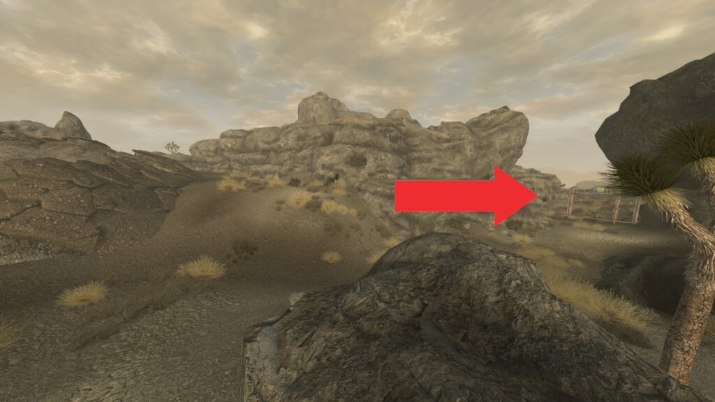 Gate from the perspective of the crater where you got the tape from the first dead pladin squad. | Fallout: New Vegas - "Eyesight to the Blind" Quest Guide