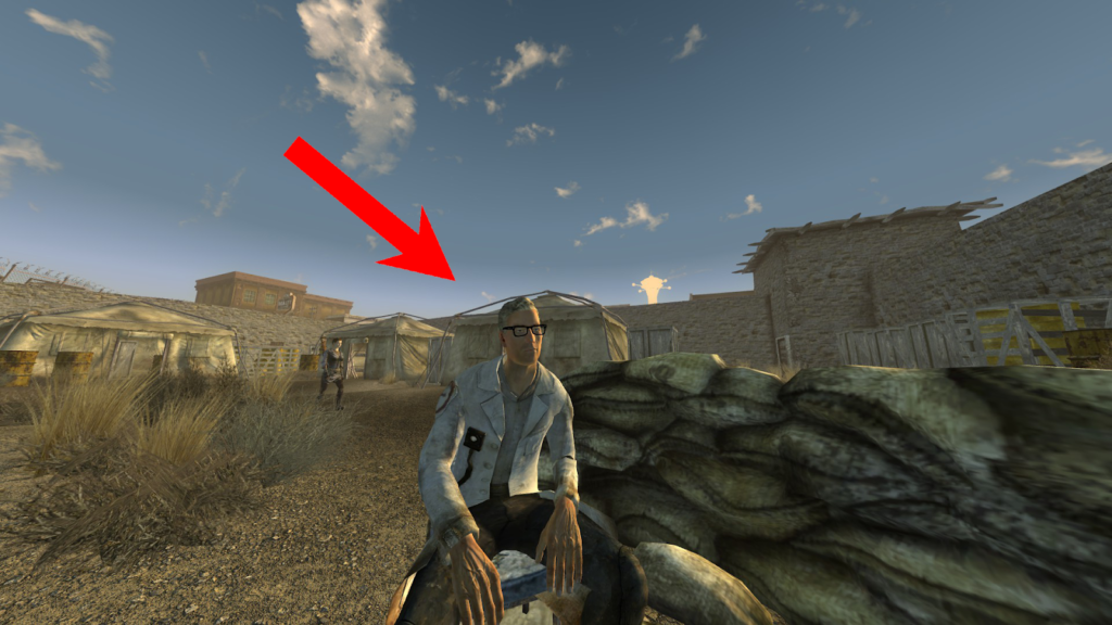 Arcade Gannon sitting behind the sandbags in the Old Mormon Fort. | Fallout: New Vegas