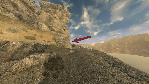 Path that leads up. White picket fence on the sides. There is a note in the bush right below the arrow | Fallout: New Vegas